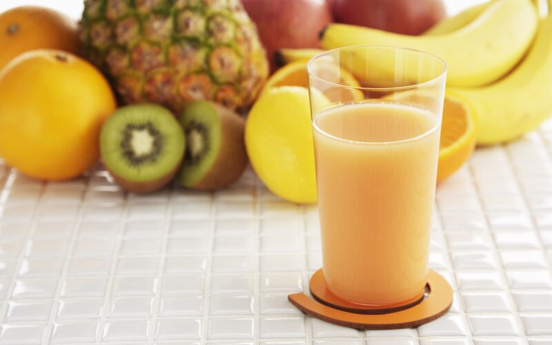 fruit juice with fresh fruits