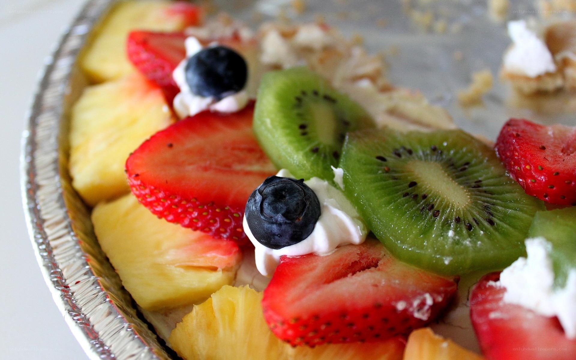 fruit pie with strawberries and kiwi