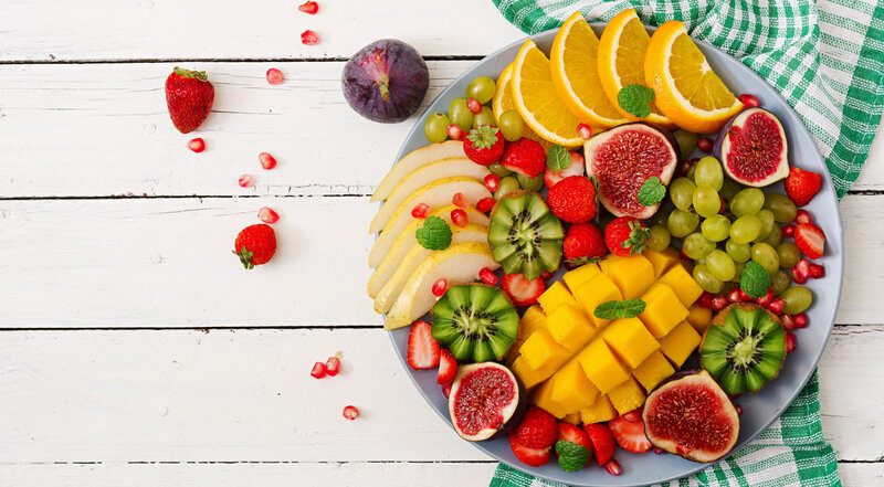 Fruit Platter on Wooden Table — White
