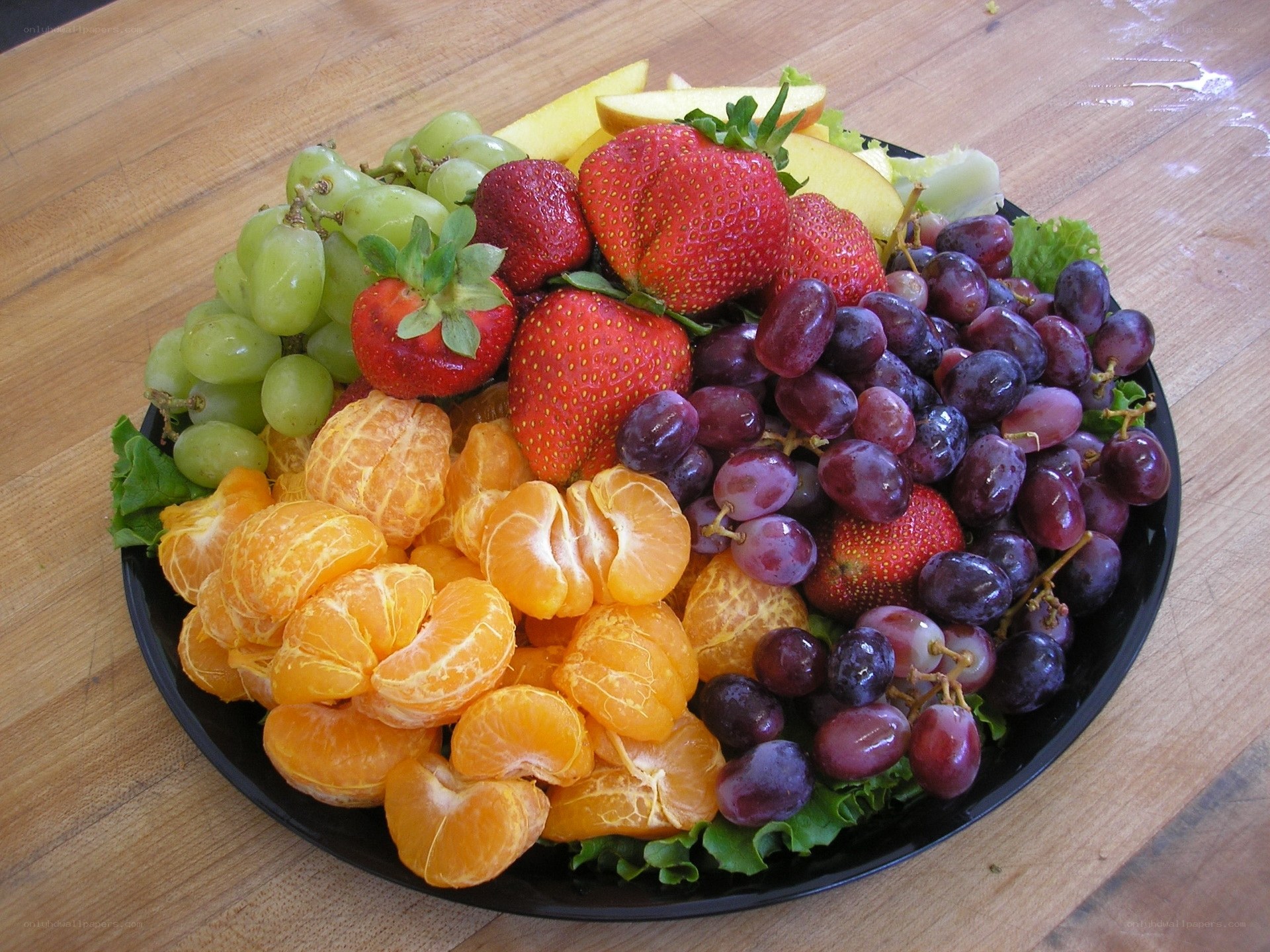 fruit platter on wooden table