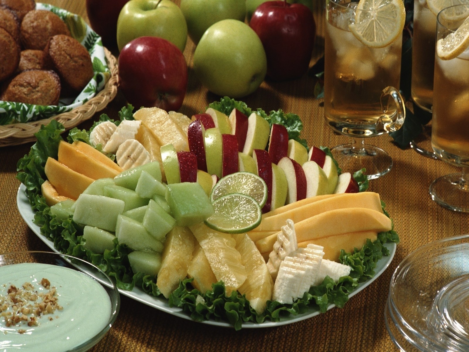 fruit platter with apples and muffins
