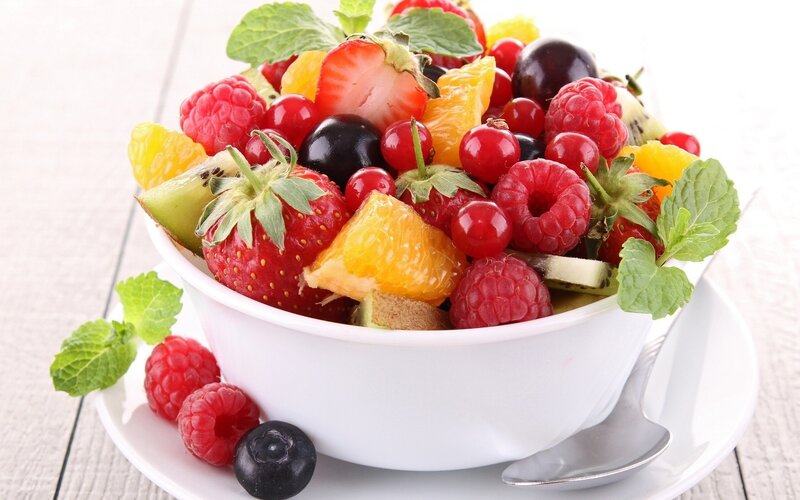 fruit salad in a white bowl