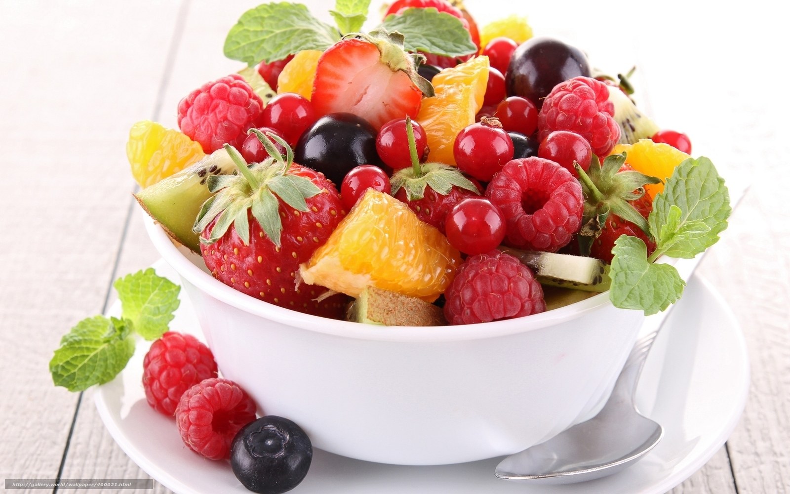 fruit salad in a white bowl
