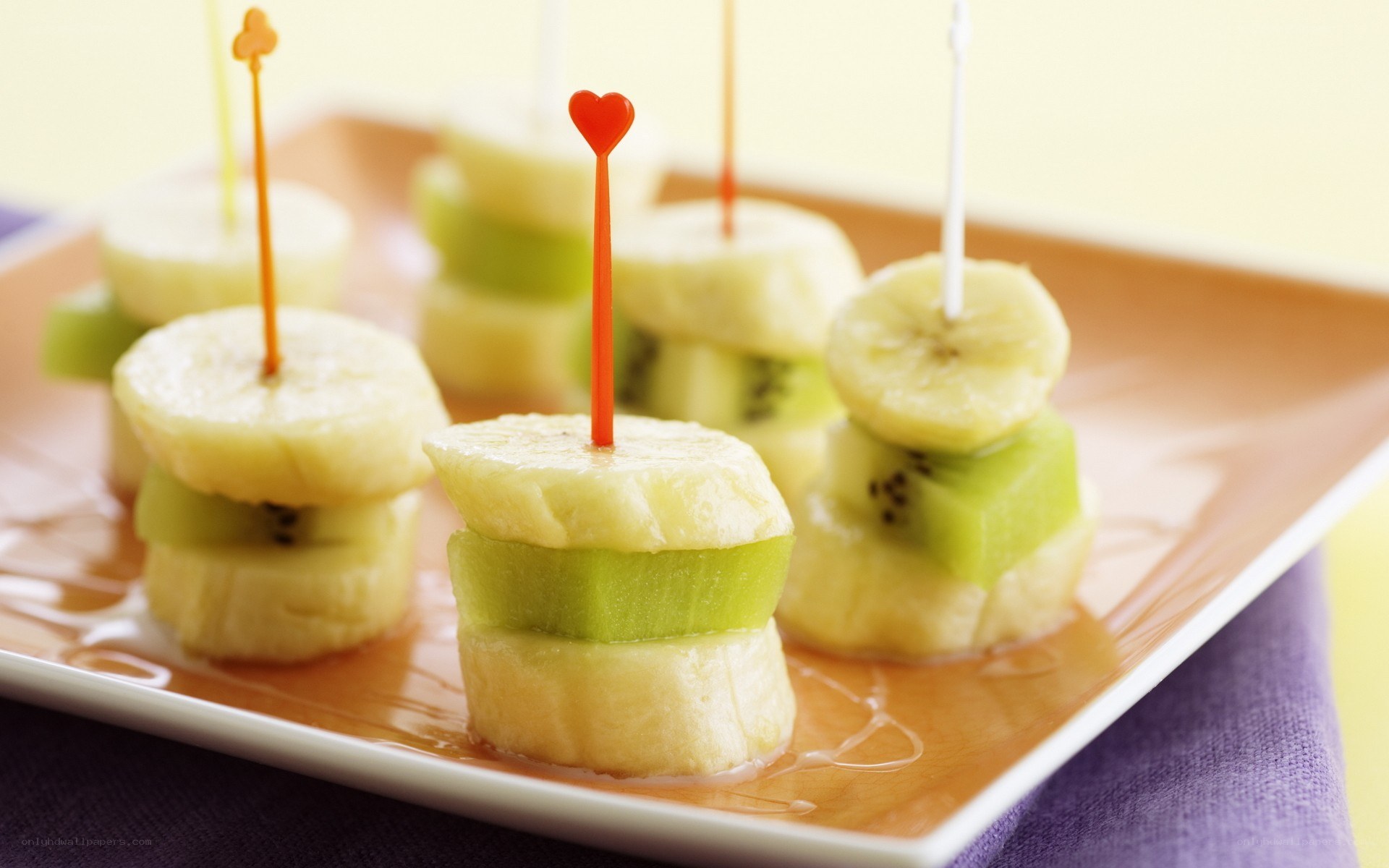 Fruit skewers on a plate