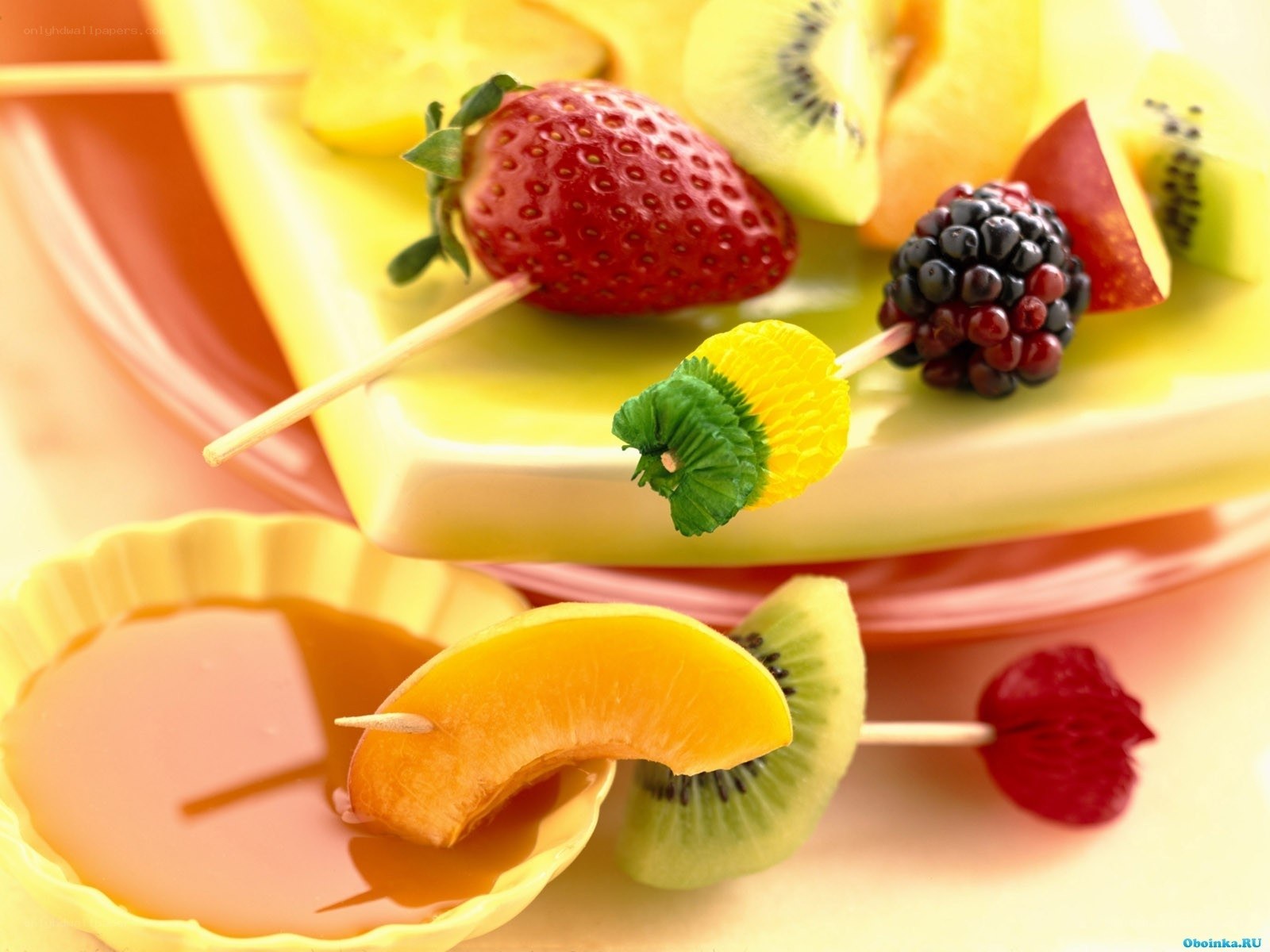 Fruit skewers with dipping sauce