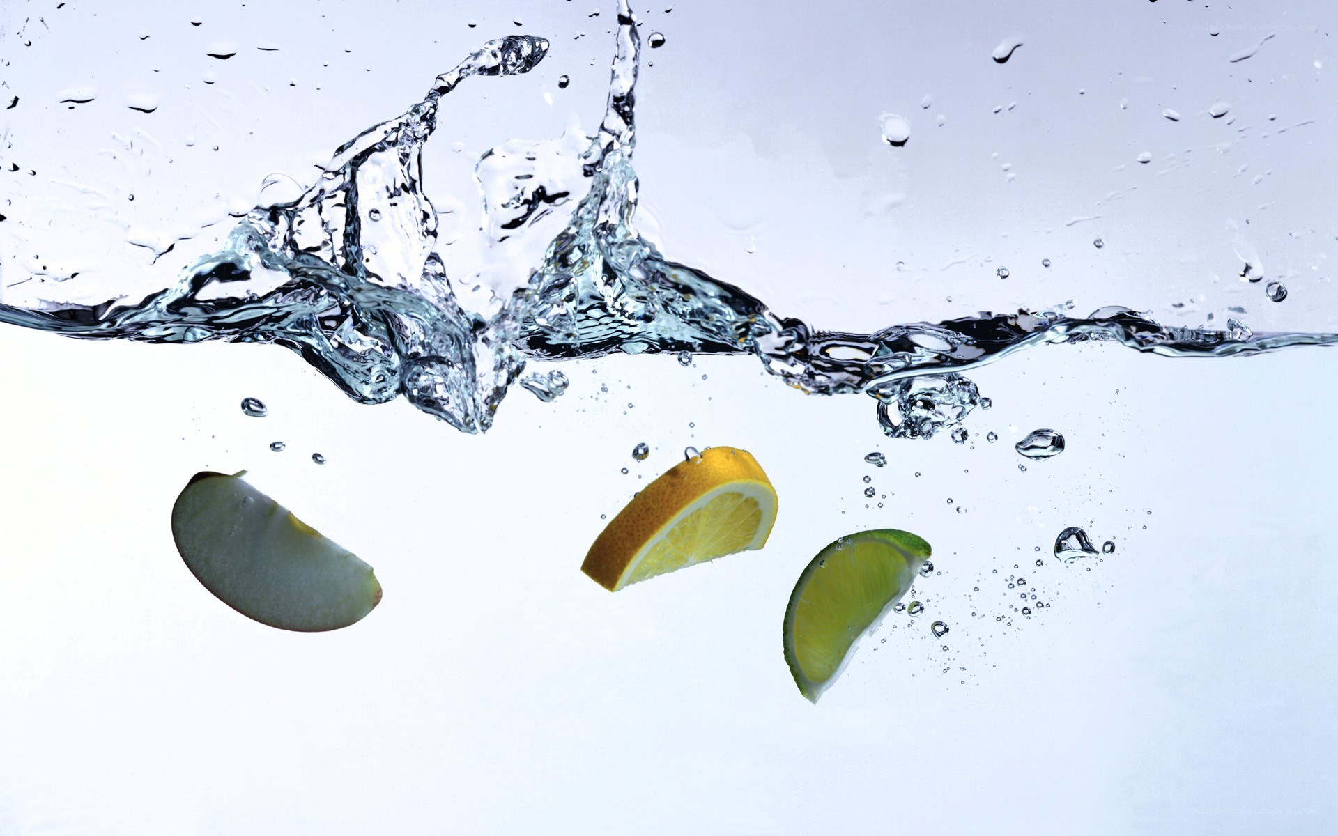 fruit slices in water splash