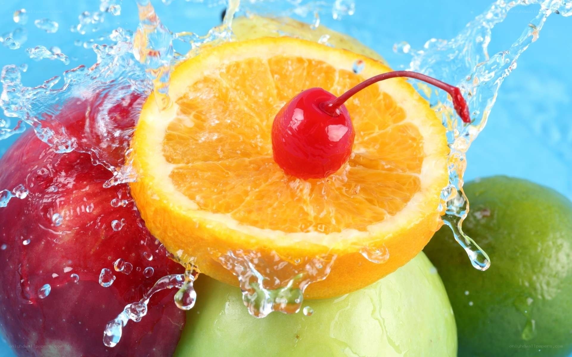 Fruit splashing in water