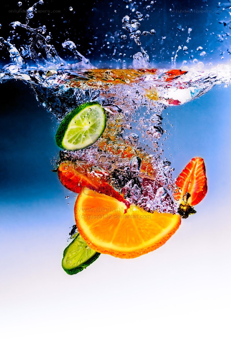 Fruit splashing into water