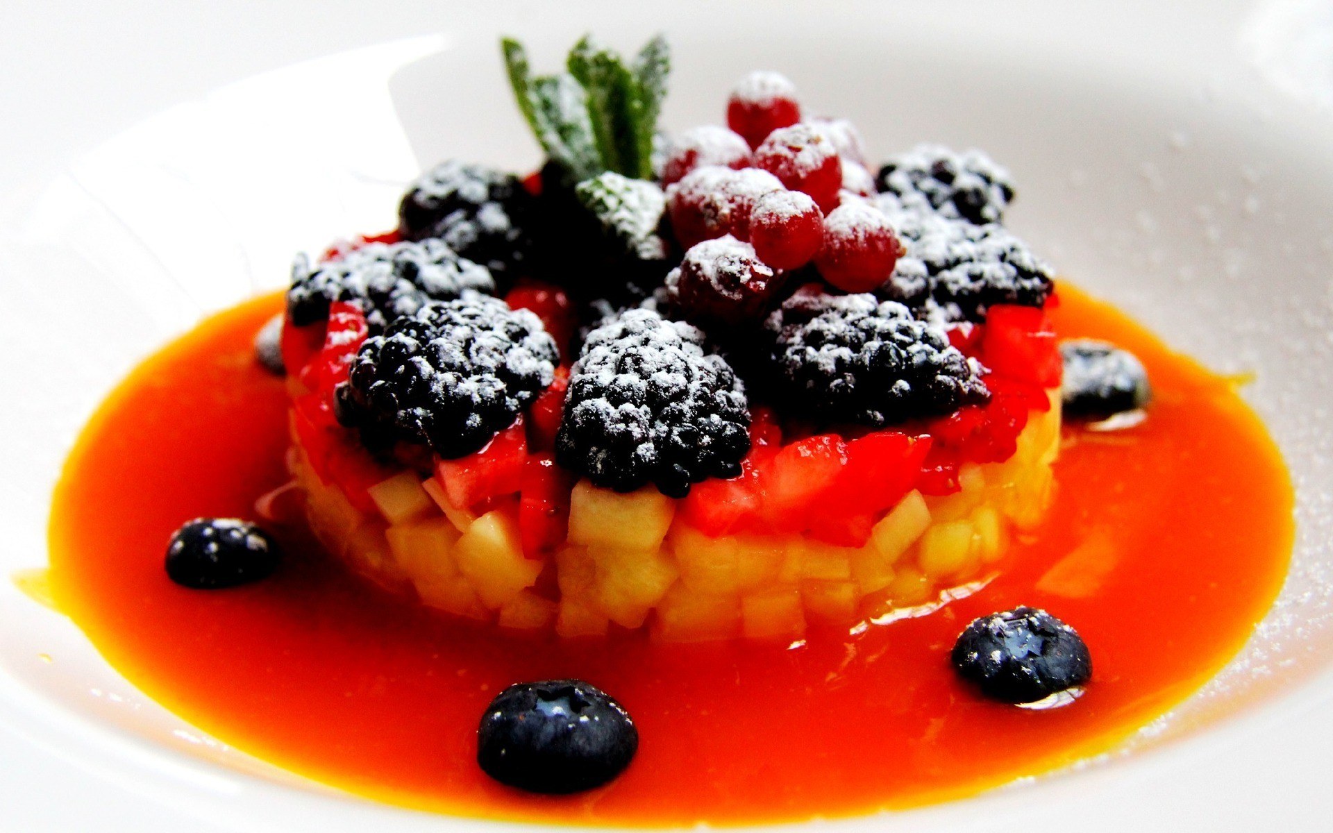 fruit tart with berry sauce