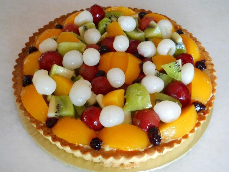 fruit tart with kiwi and grapes