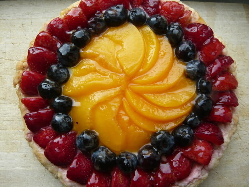 fruit tart with peaches and berries