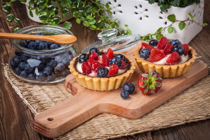Fruit Tarts on Cutting Board