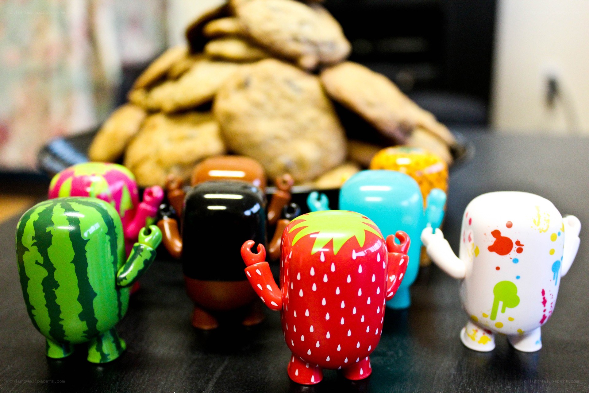 Fruit-themed figurines with cookies