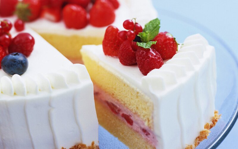 Fruit-topped cake slice