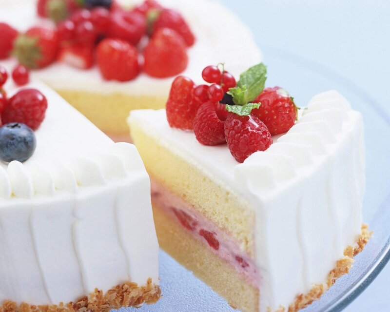 Fruit-topped cake slice