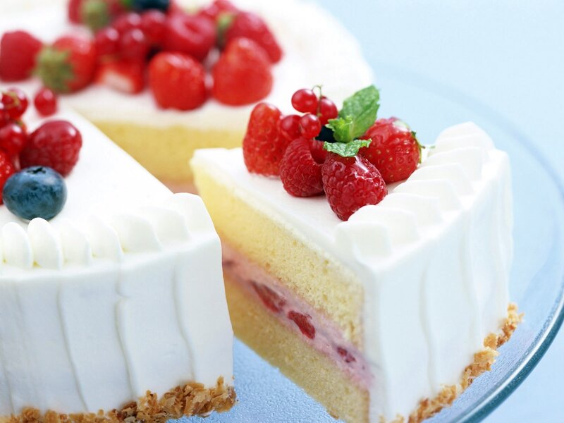 Fruit-topped cake slice