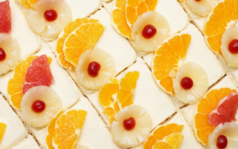 Fruit-topped cake slices