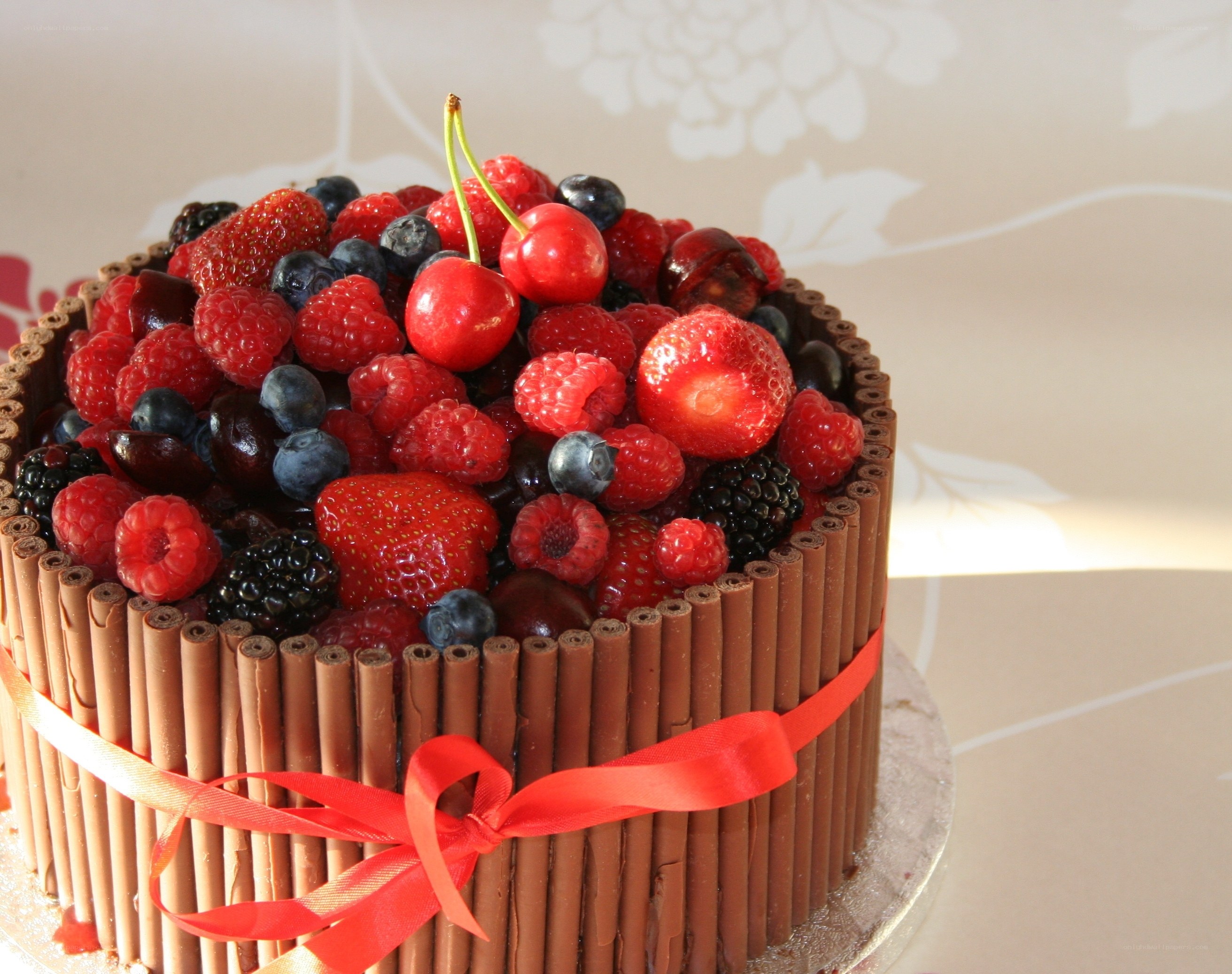 fruit-topped chocolate cake