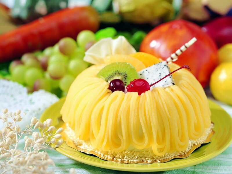 fruit-topped yellow cake