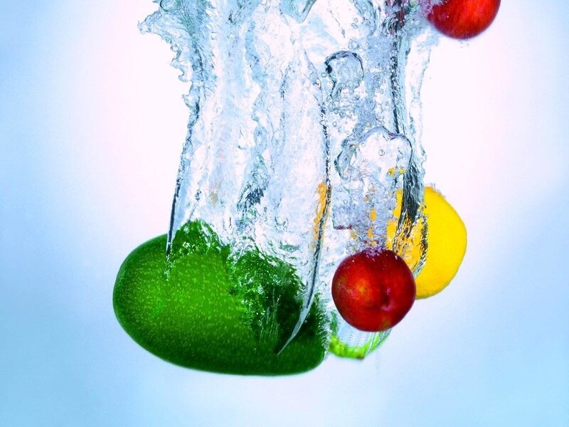 fruits splashing in water