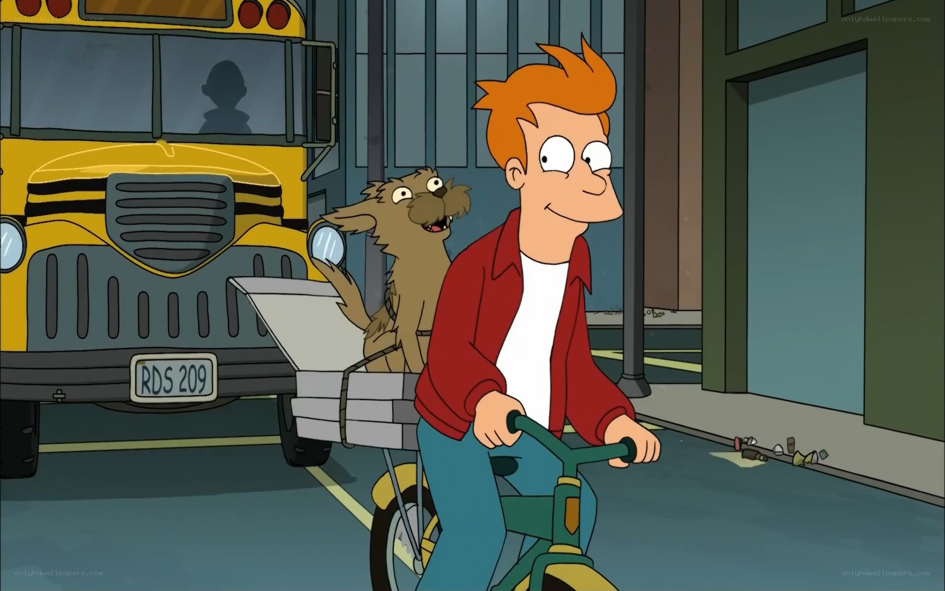 Fry rides bike with dog
