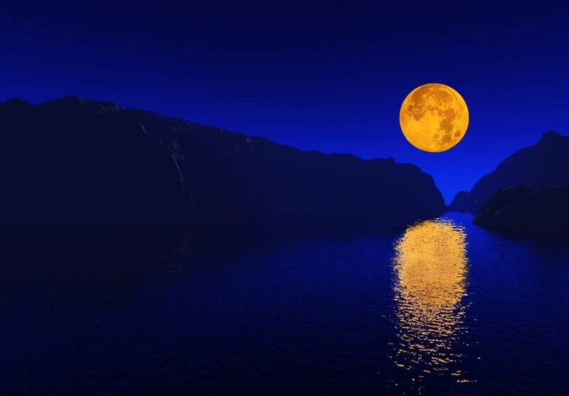 Full moon over a fjord