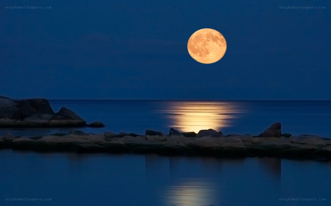 Full moon over calm sea