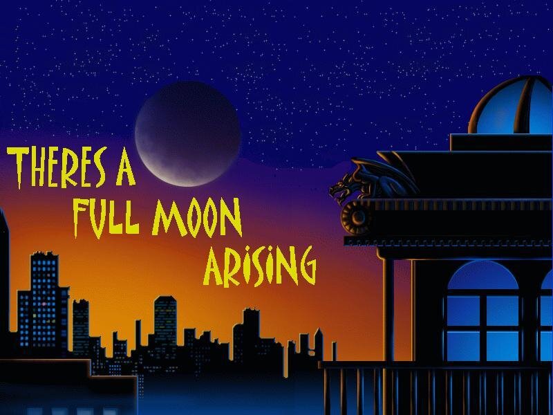 full moon over city