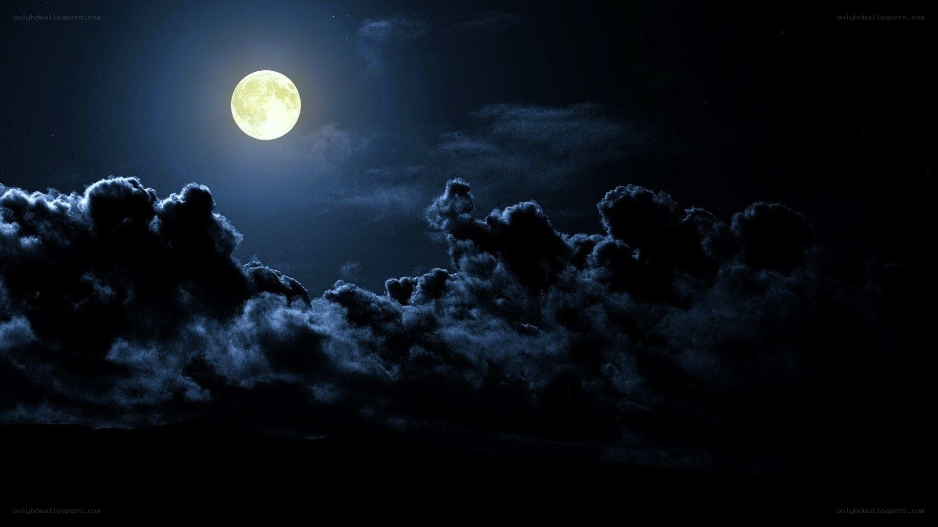 Full moon over clouds