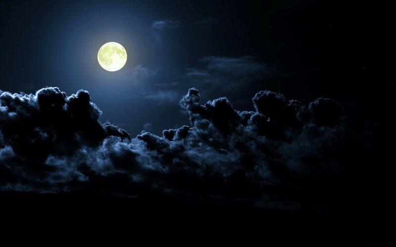 Full moon over clouds