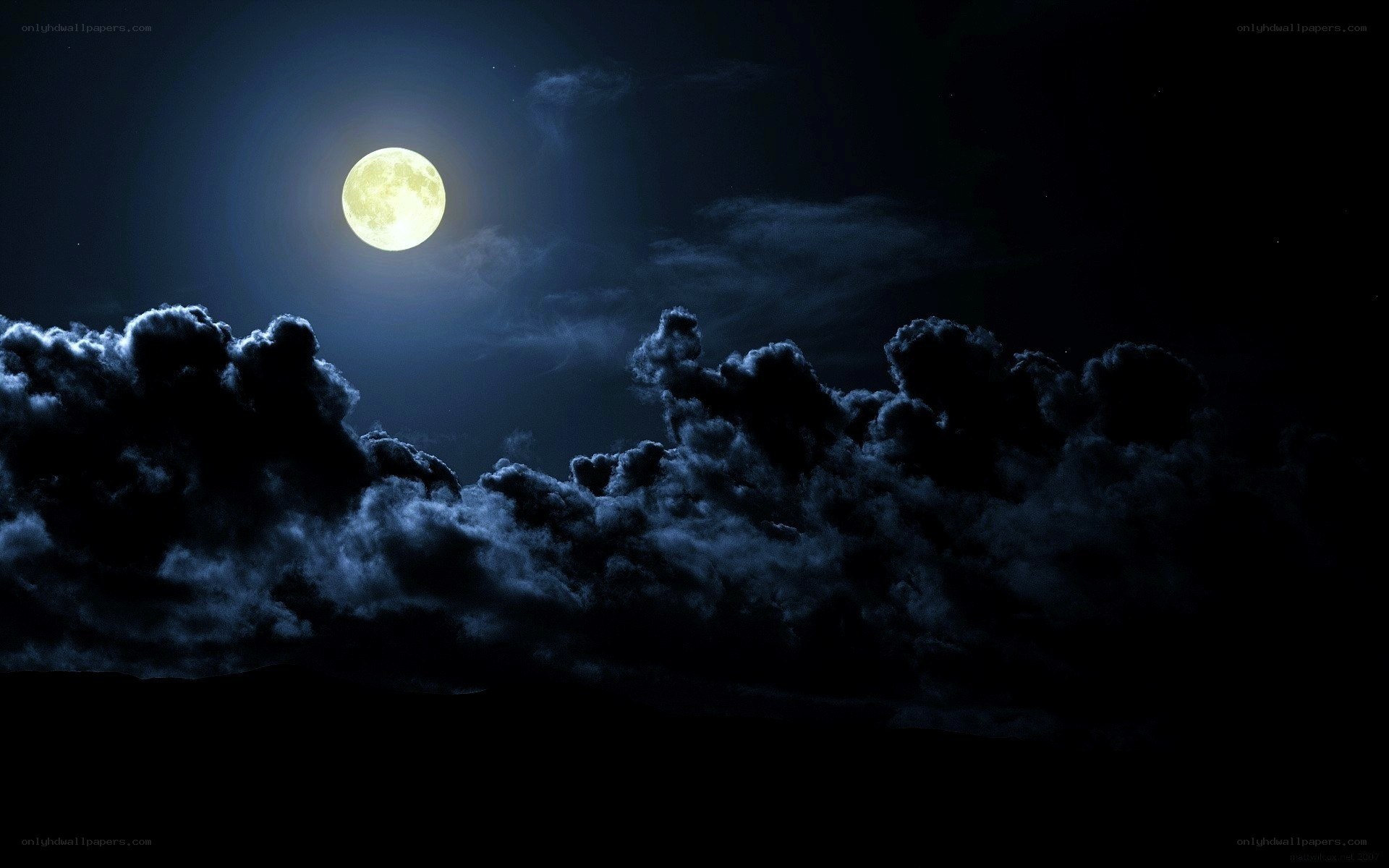 Full moon over clouds