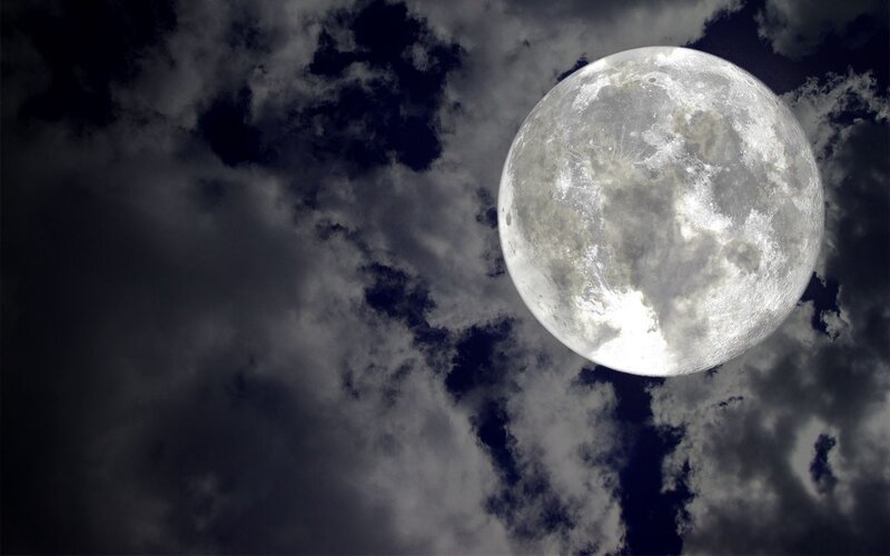 Full moon through clouds