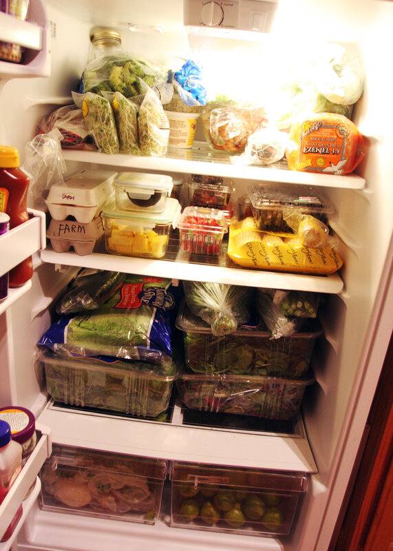 full refrigerator with groceries