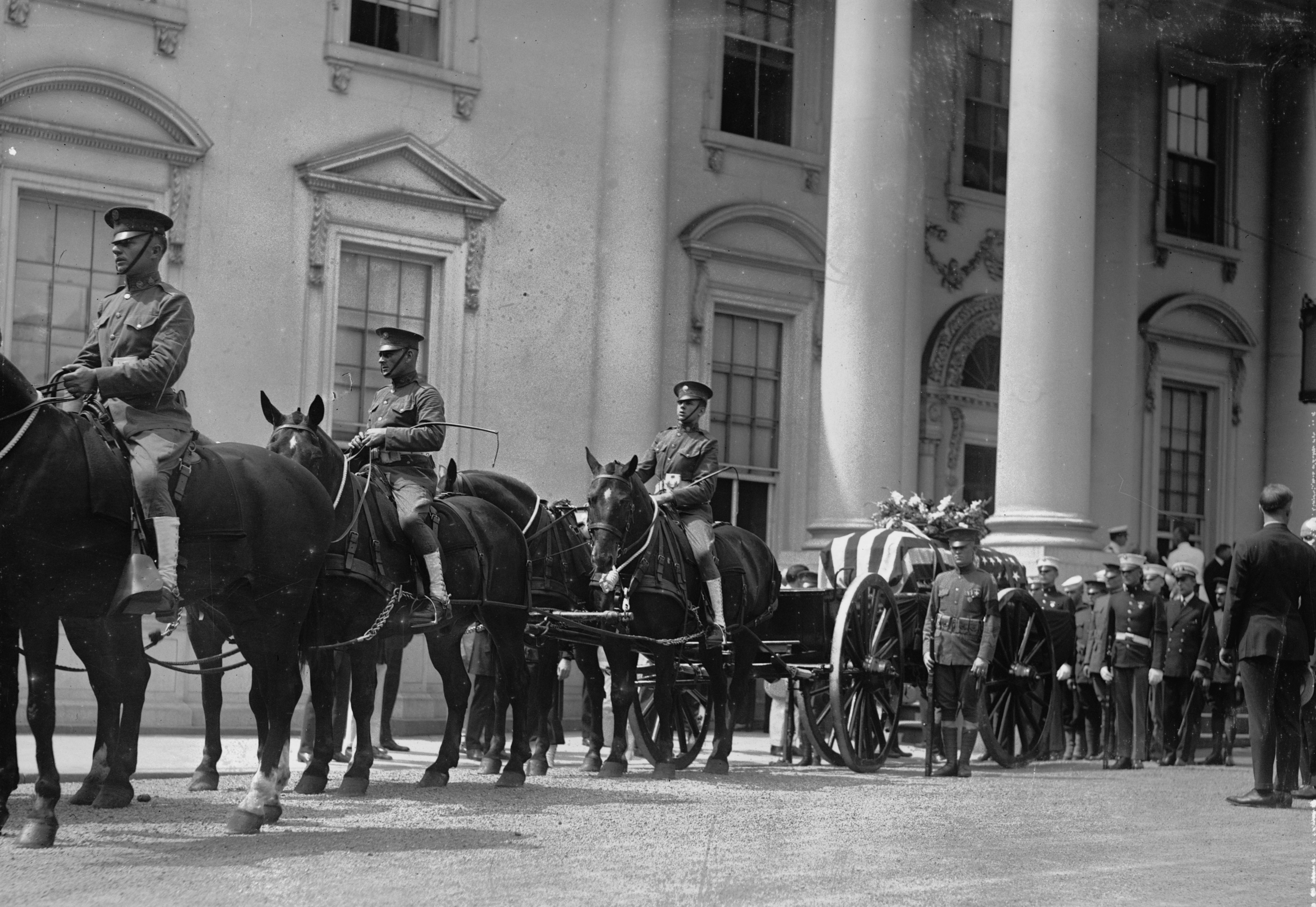 Funeral procession at a government building