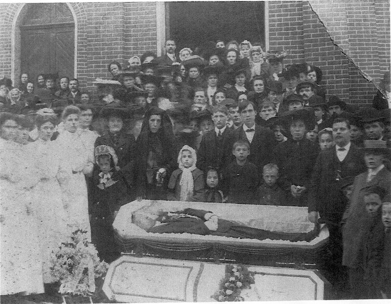 Funeral procession outside church