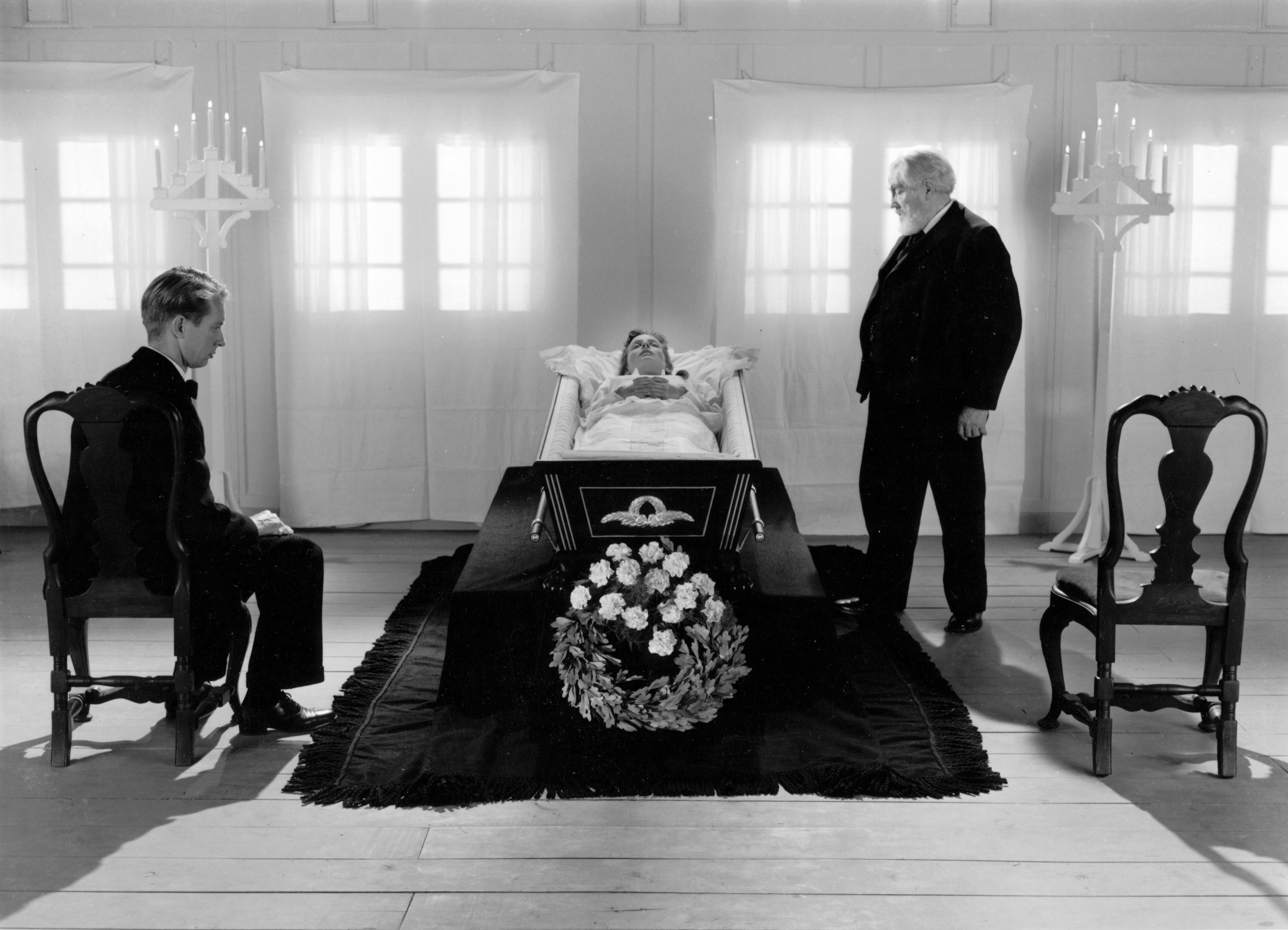 Funeral scene with coffin