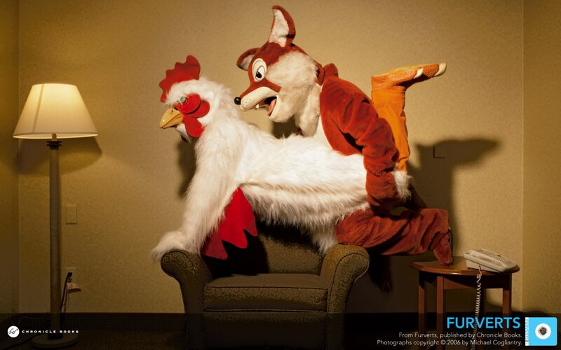 Furries in costume on a chair