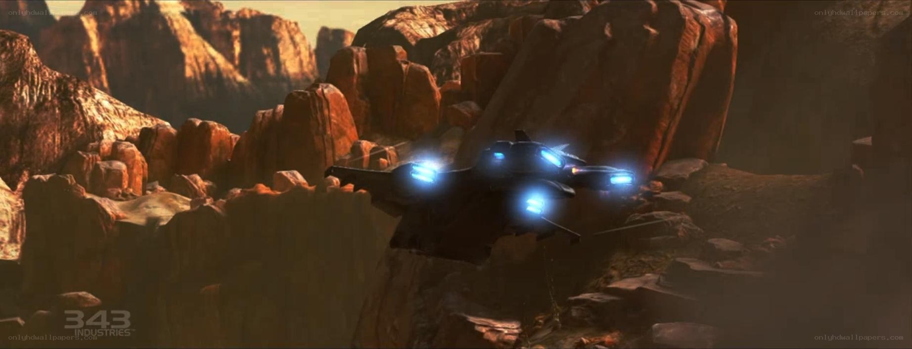 Futuristic aircraft in canyon