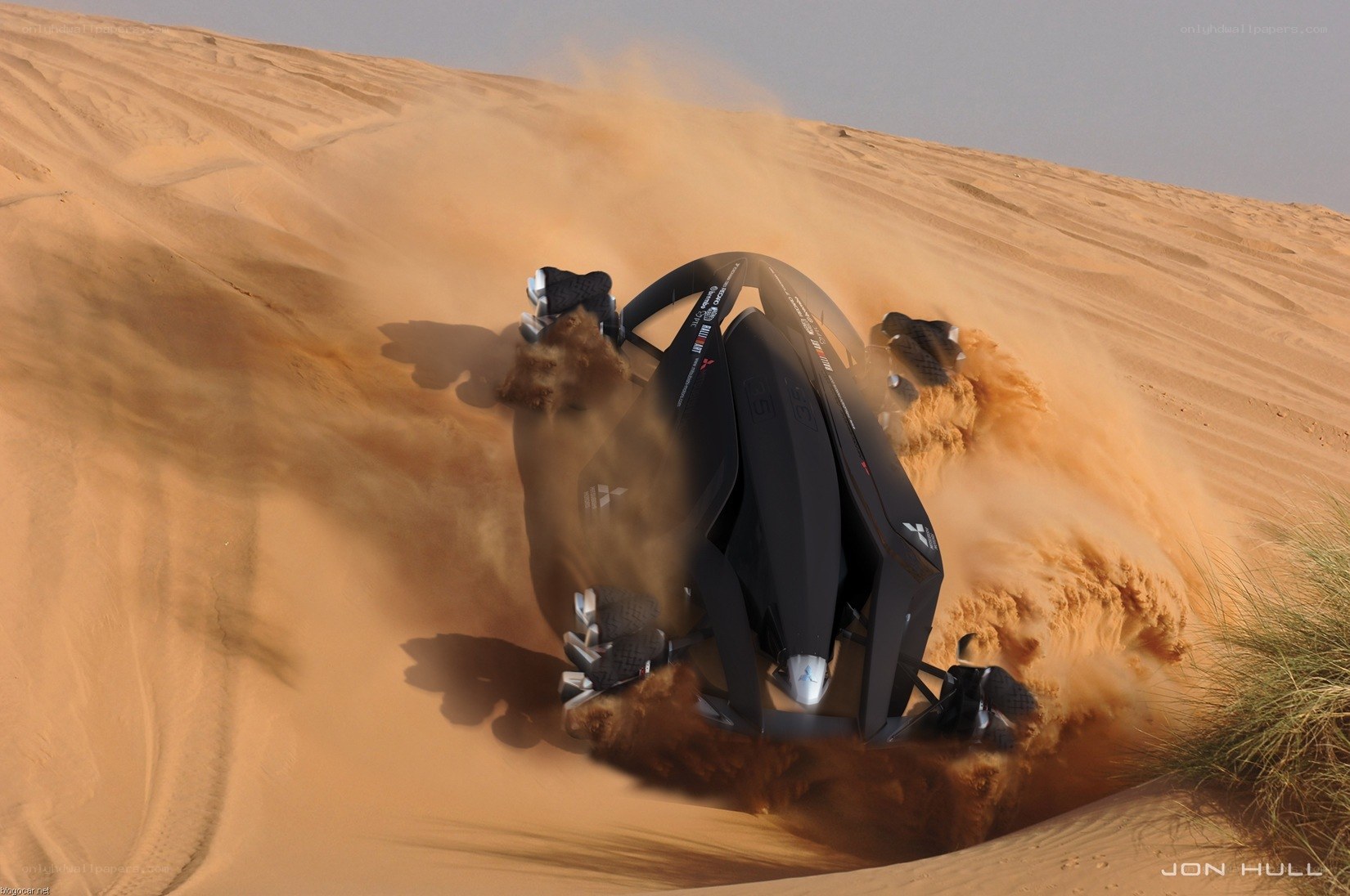 Futuristic car on sand dune