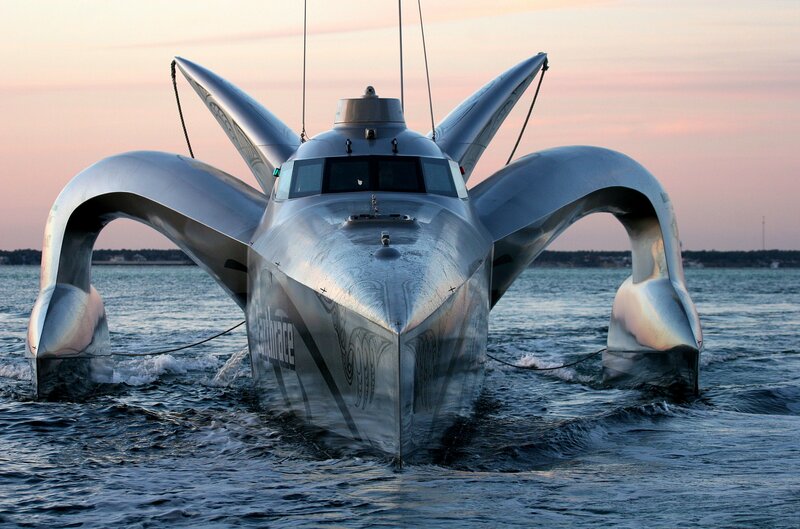 futuristic catamaran at sunset