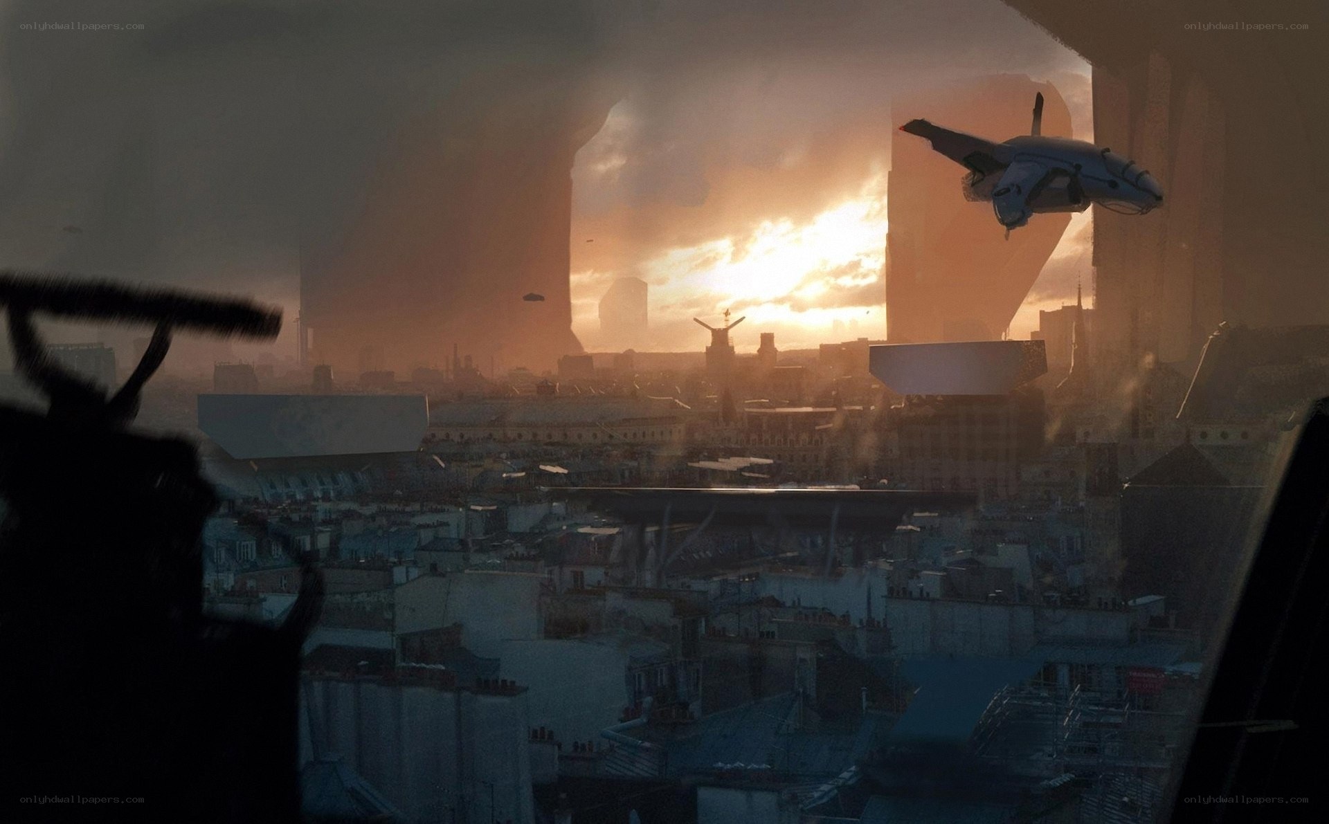 futuristic city at sunset