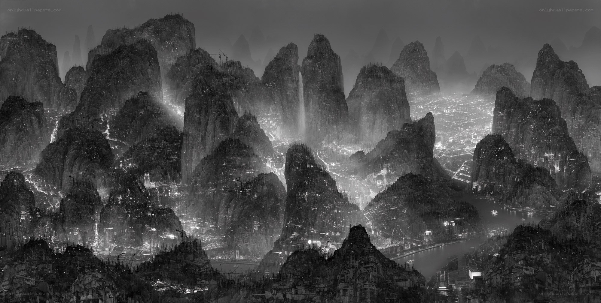 Futuristic city in mountainous landscape