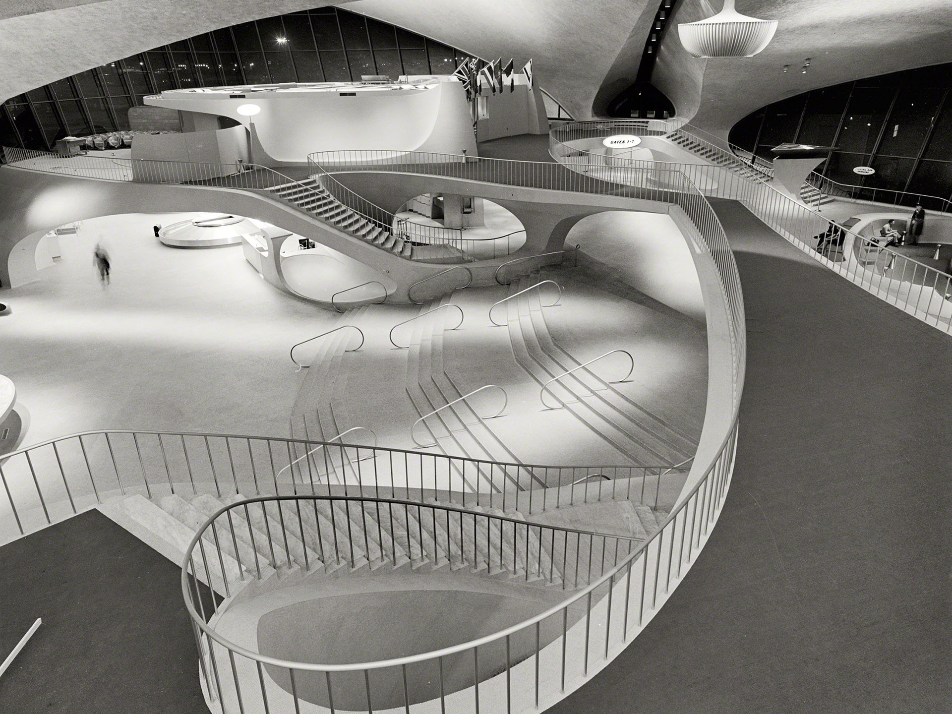 Futuristic interior with curved staircases