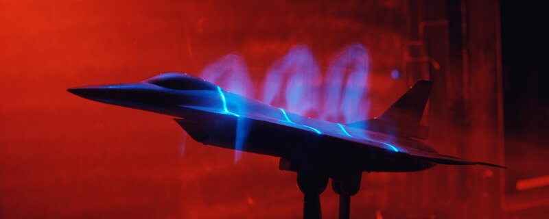 futuristic jet model in red light