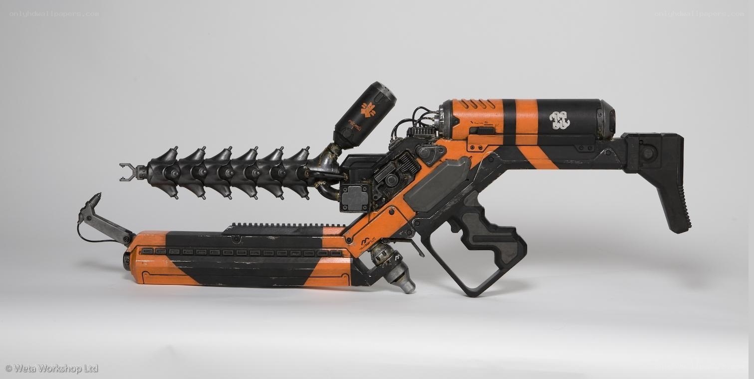 futuristic orange and black weapon