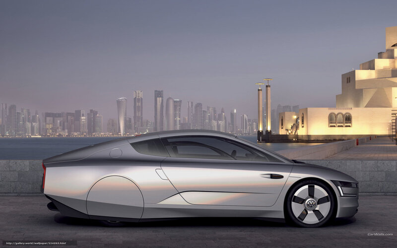 Futuristic silver car by waterfront