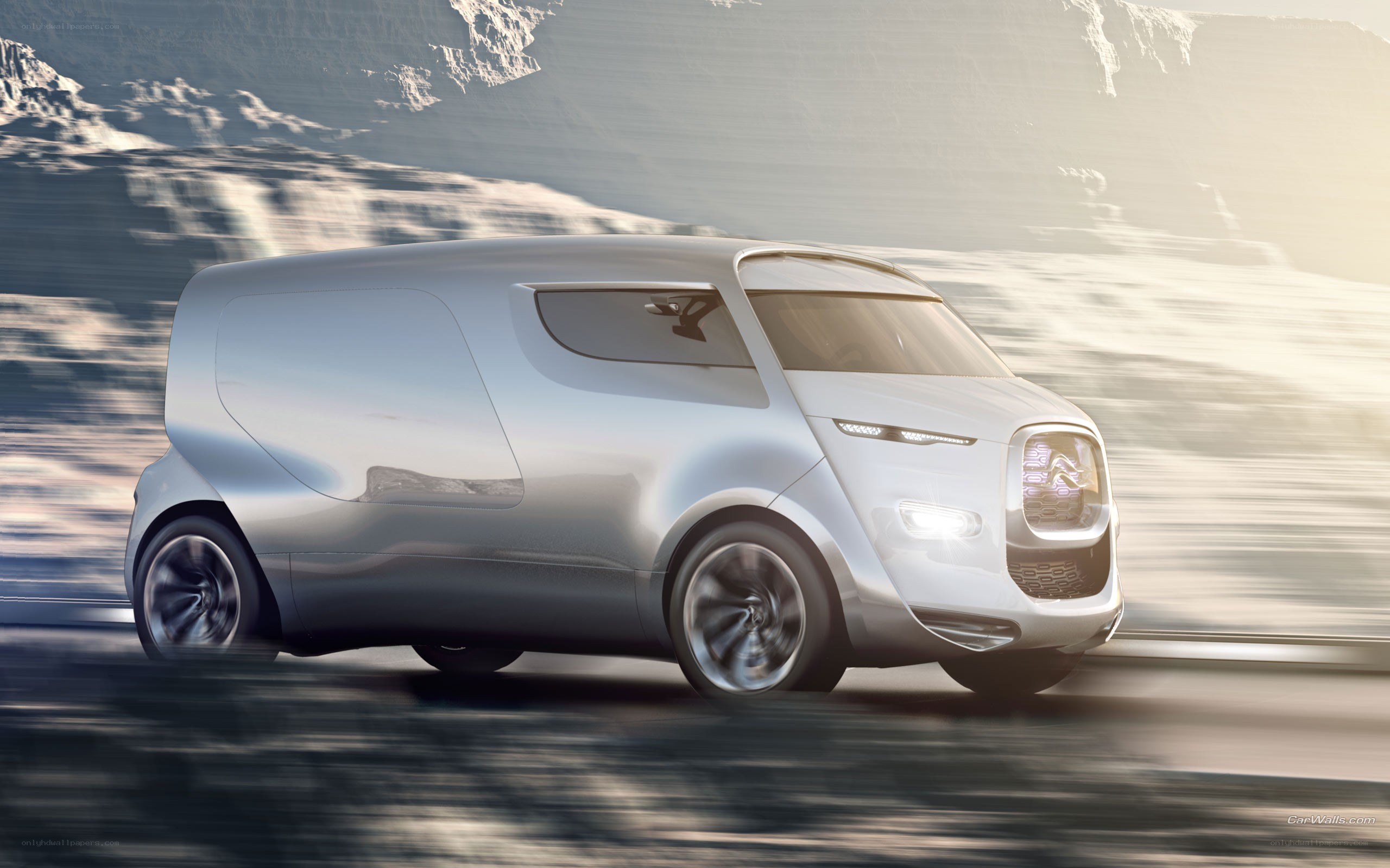 futuristic silver van in motion