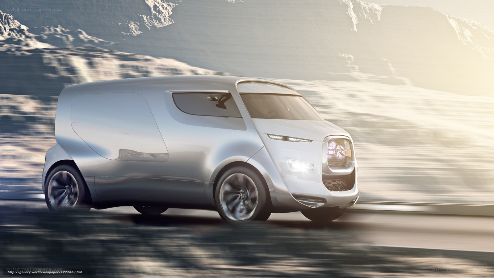 futuristic silver van in motion