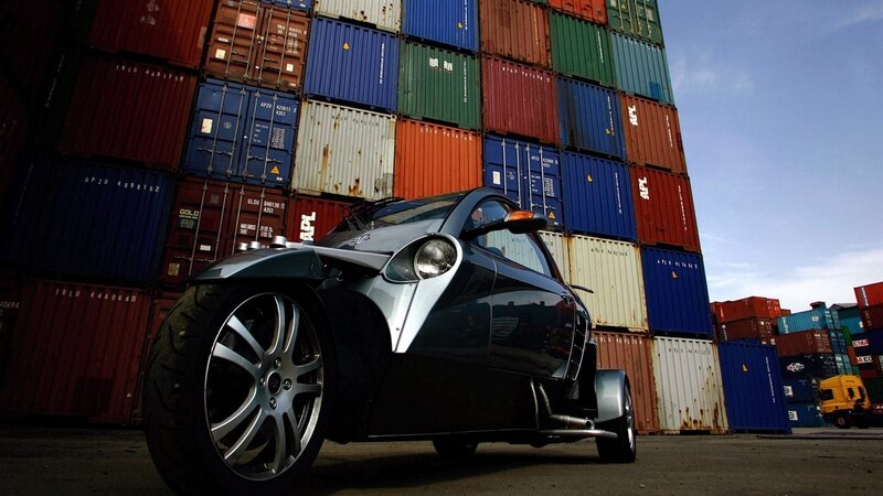 futuristic three-wheeled car at port
