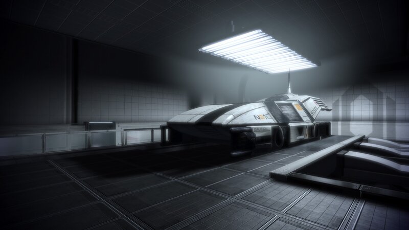 futuristic vehicle in a hangar